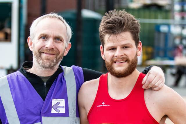 At the finish line last year, Moyleman race director Duncan Rawson and winner James Turner. Photograph: Barry Collins