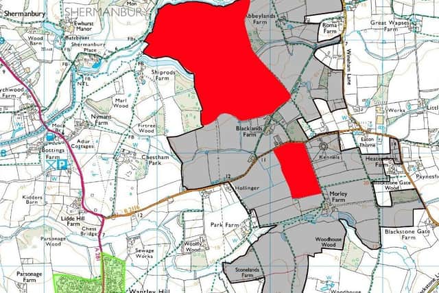 Map showing Mayfields' development boundary proposal with Rony's land in red in the top left hand corner. Henfield is in green