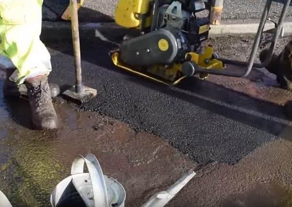 An East Sussex highways crew repairing a pothole