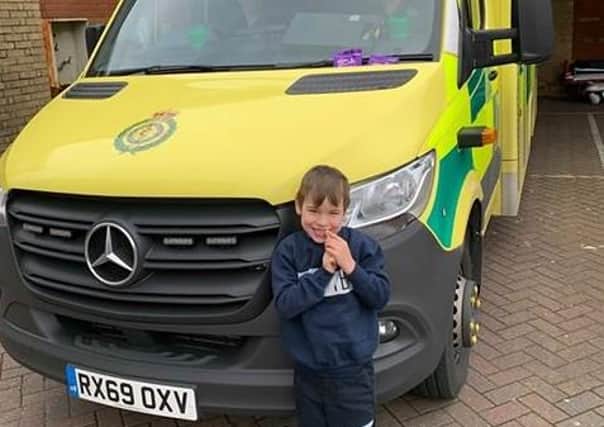 The 'Hit the Ambulance' game has arrived in our area. Ieuan Barnard, five, from Littlehampton, with the ambulance in Goring