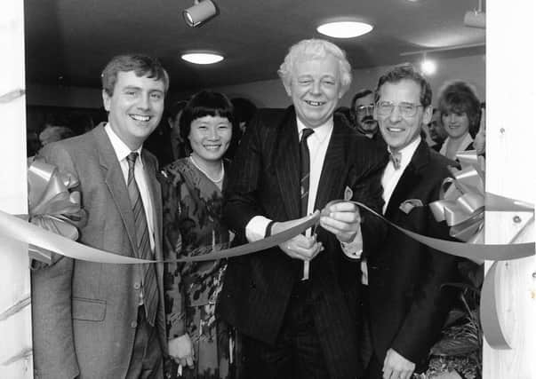 Late councillor John Burningham cuts the ribbon at Storrington Glebe Surgery’s official opening ceremony. Pictured with him are then partners, Dr Martin Kalaher, Dr Bonnie Tse, and Dr David Whitehead.