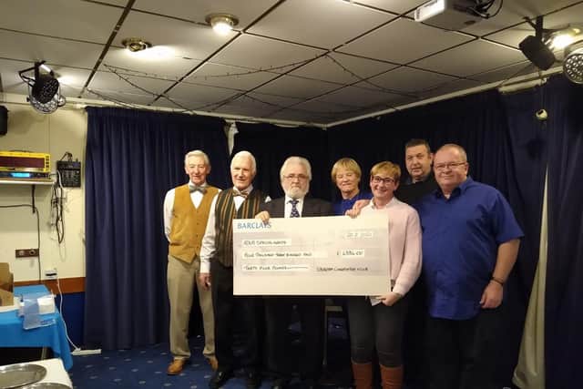 Shoreham Conservative Club members with Adur Special Needs Project trustee Heidi Rush