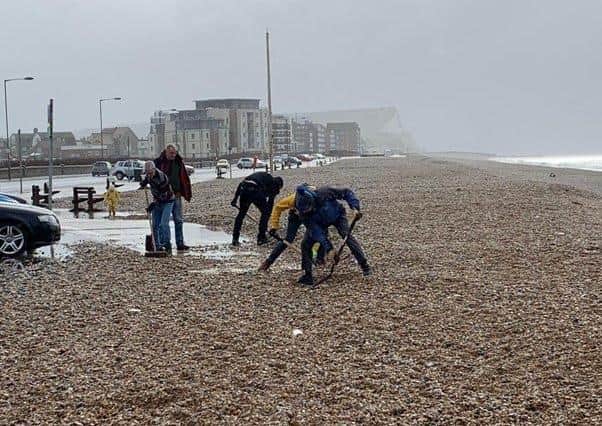 The runners cleared the shingle covered promenade several times after stormy weather