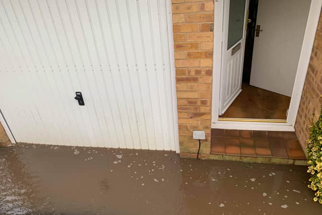 Flooding outside Michelle and Rachel's home in Newhaven