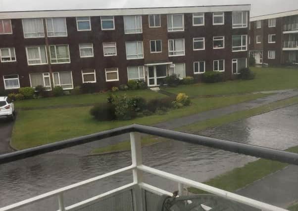 Flooding in Overstrand Avenue. Photo by Zoe King