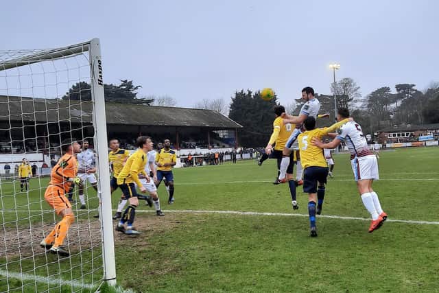 Gary Elphick wins a header. Picture by Emma Young