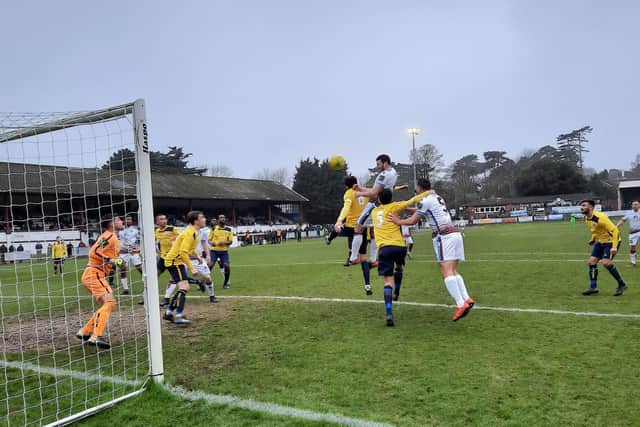 Gary Elphick wins a header. Picture by Emma Clements