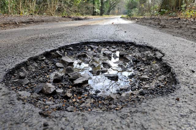 Pothole in Byfleets Lane. Pic Steve Robards SR20020701 SUS-200702-132244001