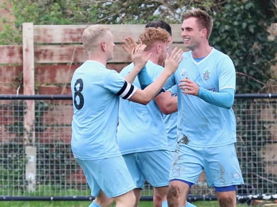 Eastbourne Town celebrate scoring against Pagham on Saturday. Picture by Joe Knight