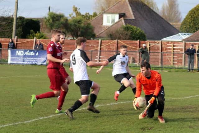 Action from Pagham v Little Common / Picture: Roger Smith