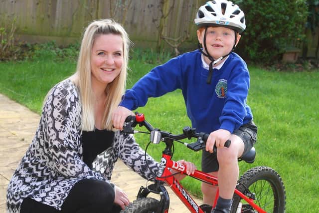DM2031255a.jpg Billingshurst resident starts campaign for a pump track. Pictured with son Parker aged 6. Photo by Derek Martin Photography SUS-200317-171109008