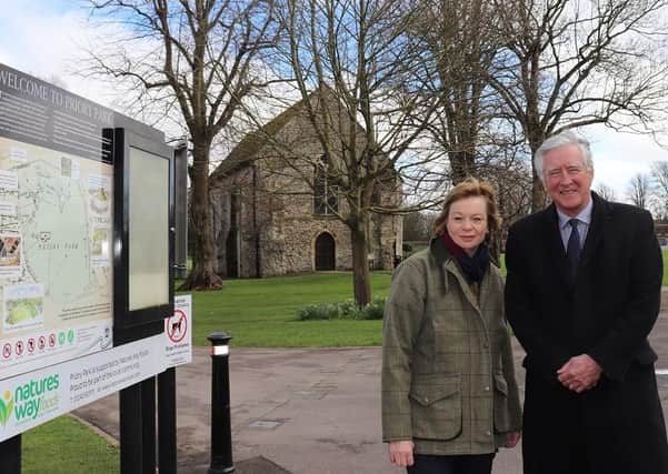 Penny Plant and Martyn Bell at Priory Park with the Guildhall in the background
