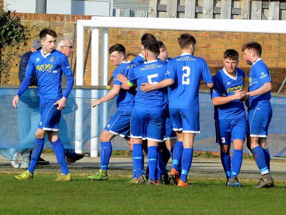 Selsey celebrate a goal as they battle back for victory over Seaford / Picture: Kate Shemilt