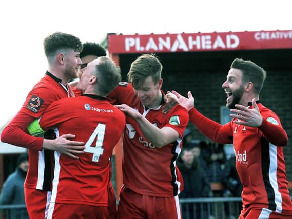 Borough players celebrate on their way to last Saturdays victory over Maidstone - but its a scene that wont be repeated for a while. Picture by Jon Rigby