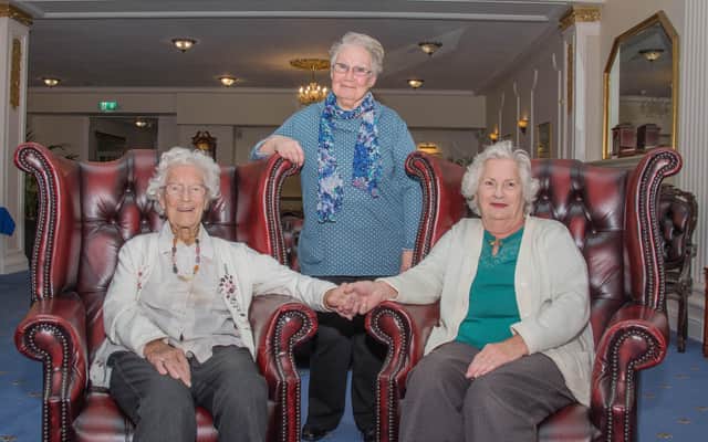May Willis (left) with her daughter, Vera Smith (right) and longtime close friend, Elsie Gill, (centre back) SUS-200324-120554001