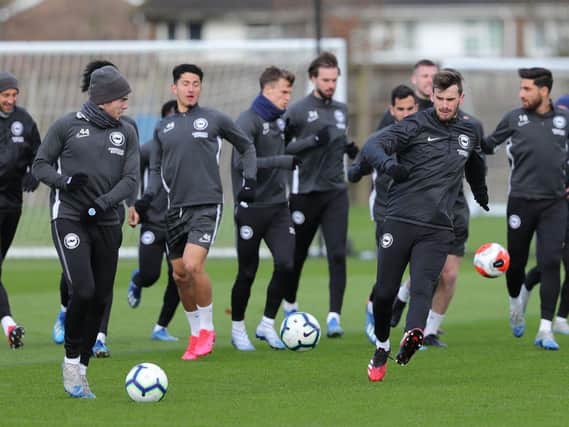 Brighton and Hove Albion players will not train as group for two weeks
