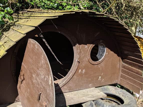 The school's Hobbit House has had its door pulled off and slats ripped off the roof. Picture: Marie Burgess