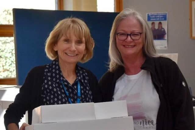 Tracy Thompson, right, delivering cakes to Worthing Hospital. Picture: Kate Henwood Photography