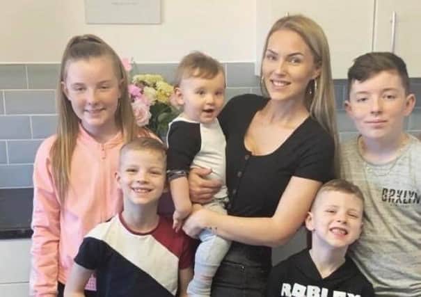 Lucy Scott, owner of Beauty Bake, with her five children