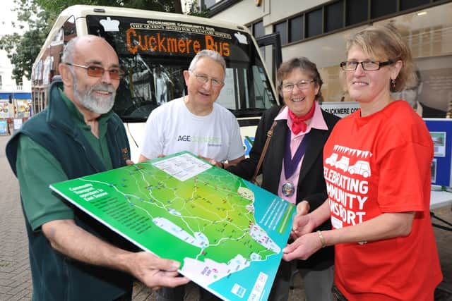 The Deputy Mayor of Eastbourne Cllr Janet Coles visited a display in Terminus Road 'Celebrating Community Transport' which showed the wide number of community bus shemes available to local residents. (L to R): John Bunce of Cuckmere Community Buses, Roger Hudson of AGE Concern Eastbourne, Deputy Mayor Cllr Janet Coles and Jenny Watson of 3VA. September 27th 2013