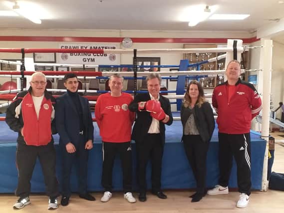 Pictured  left to right: Paddy Harmey, Sulman Mirza, National Association of Girls and Boys Clubs, Southern Counties Champion Under 56kg, Ron Parsons, club secretary, Henry Smith MP  Claire Webley of The National Lottery Community Fund and Rees Hopcraft, club chairman