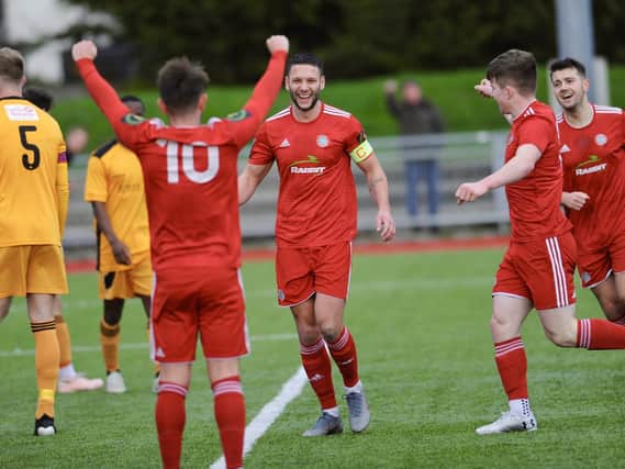 Worthing celebrate a goal against Merstham in January - now their season's efforts have been shown to be in vain / Picture: Stephen Goodger