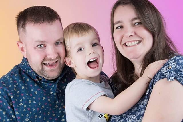 Graham with five-year-old son Reuben and wife Amber SUS-200327-120159001