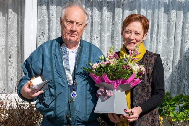 Worthing Lions president Tony Carter with Mother's Day competition winner Carol Durrant. Picture: Lee Milner