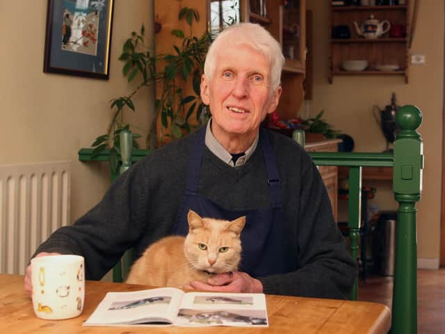 Peter Voigt and his cat, Josephine