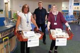 Delivery of scones and jam from The Hydro Hotel to workers at the DGH