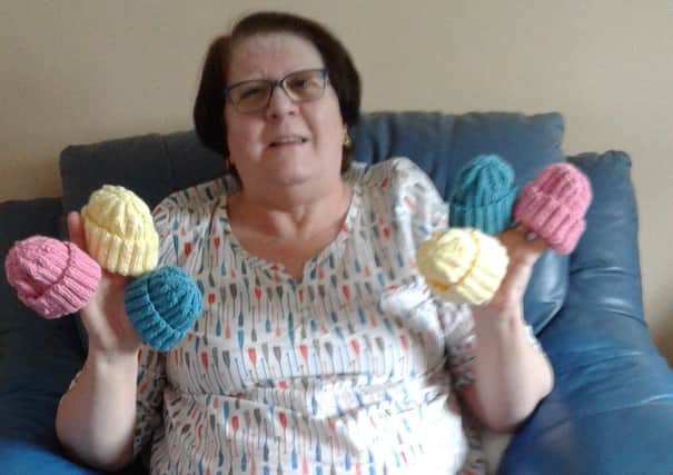 Uckfield resident Denise Hubbard has knitted hats for premature babies during a time of social distancing measures
