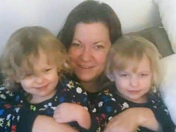 Kelly Fitzgibbons (centre) with Ava Needham (left) and Lexi Needham (right). Photo: Sussex Police