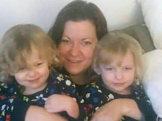 Kelly Fitzgibbons (centre) with Ava Needham (left) and Lexi Needham (right). Photo: Sussex Police