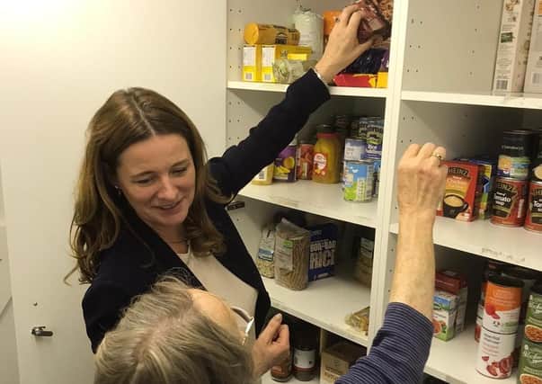 Gillian Keegan MP visiting the Midhurst foodbank last year
