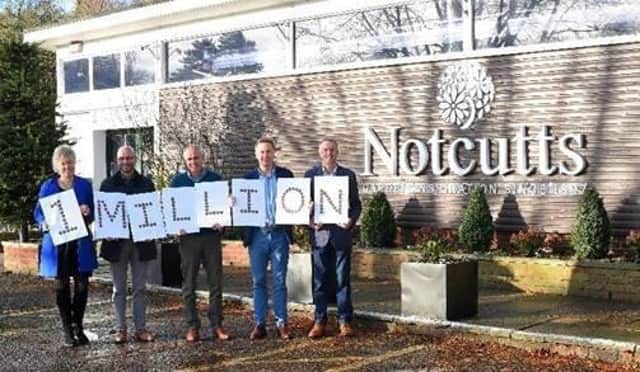 Caroline Notcutt, Vice Chairman of Notcutts celebrates one million Pennies donations across Notcutts Group Ltd nationally, with Nick Burrows, CEO; Julian Herbert, Chief Financial Officer; Andrew Notcutt; and Bryan Laxton, Non-Executive Director. SUS-200204-141326001