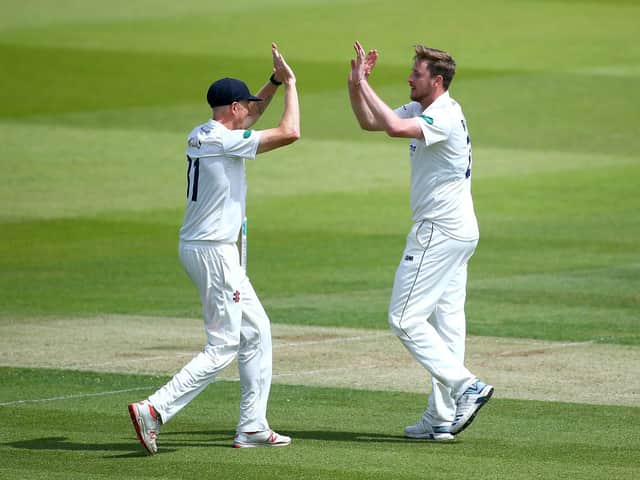 Ollie Robinson is congratulated by Luke Wells on one his many county championship wickets / Picture: Getty