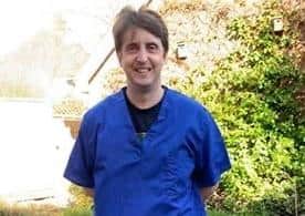 A local GP in scrubs sewn by Marilyn Ambrose
