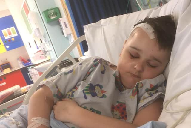 Charlie Clayton, nine, had part of a brain tumour removed