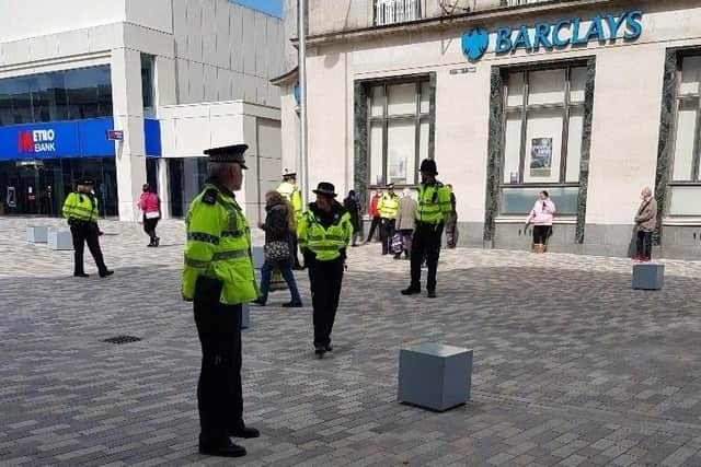 Police outside the Beacon shopping centre in Eastbourne