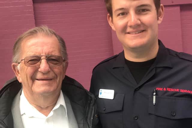 Tony with his grandson at his passing out parade in the fire service - one of his proudest moments