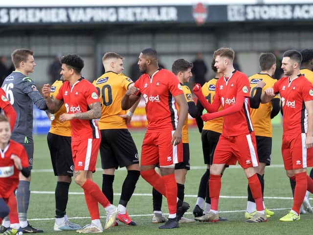 Elbow bumps for Eastbourne Borough and Maidstone players before what proved their final game before the lockdown