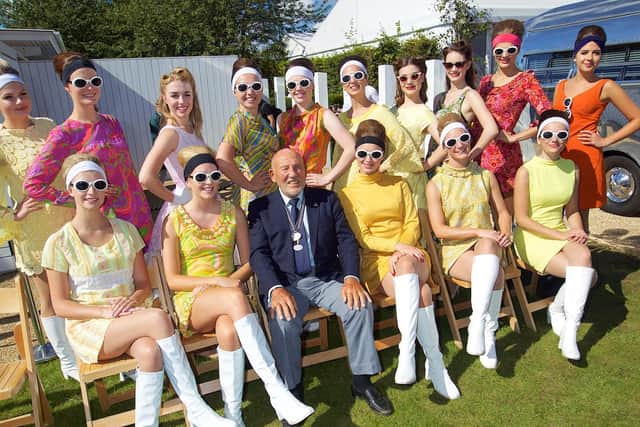 Sir Stirling with the grid girls in 2016 / Picture: Michael Reed