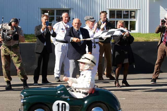 Sir Stirling Moss in action for the Settrington Cup at Revival / Picture: Michael Reed