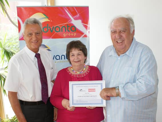 Malcolm Toghill, Maureen Bennett and Cliff Bennett at an awards ceremony in 2013 ENGSUS00120120828134702