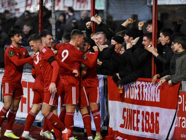 Worthing celebrate a goal against Horsham with their fans - but their rise to the top of the Isthmian premier division looks like being for nothing / Picture: Stephen Goodger