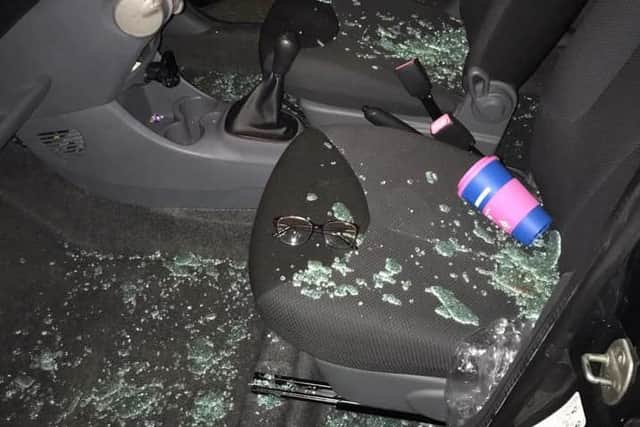 The car was covered in glass after the break-in