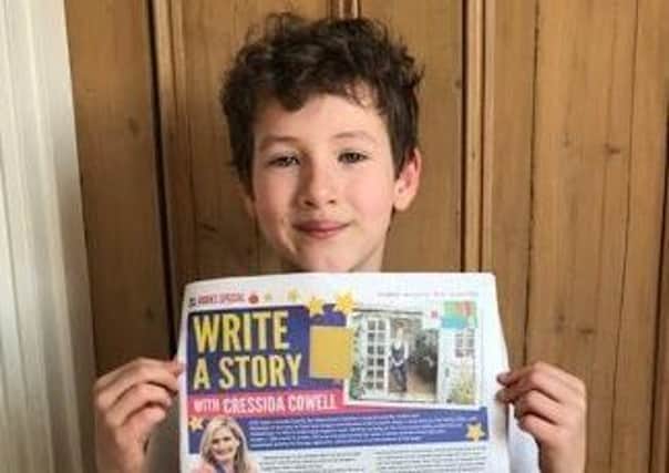 George Kauders from Cranleigh won a competition to write the next instalment of a story written by How To Train Your Dragon author Cressida Cowell SUS-200415-142014001