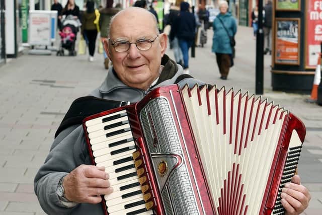 George Smewing, pictured outside M&S in Montague Street in Worthing, has passed away aged 90