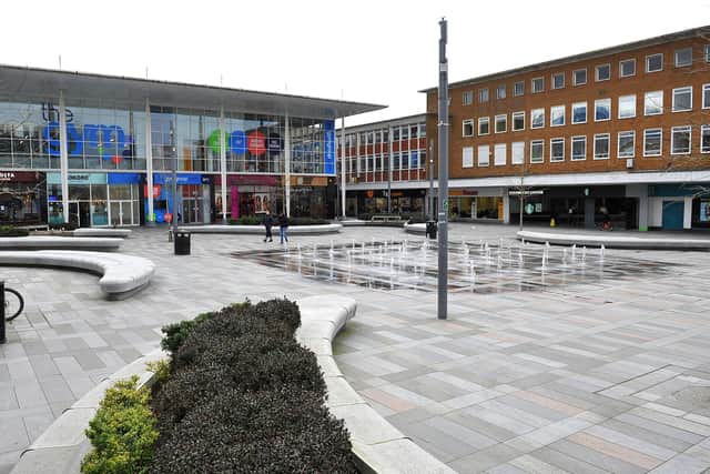 a near deserted Queens Square pictured last month