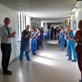 Colleagues at the Conquest Hospital clap as Uma is moved out of critical care. Picture: ESHT